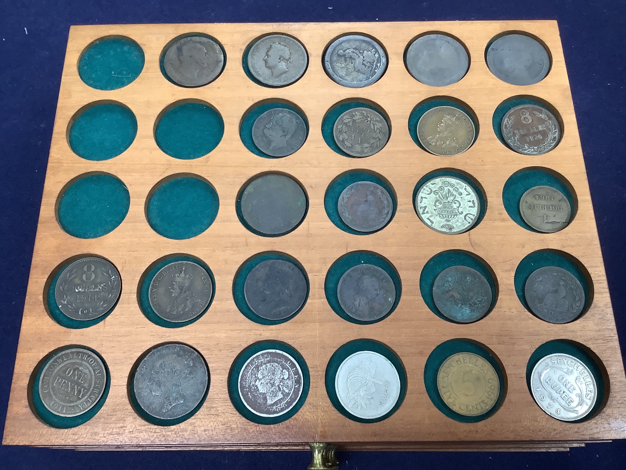 A coin collection in a coin collector's case, 30 x 26 x 17cm